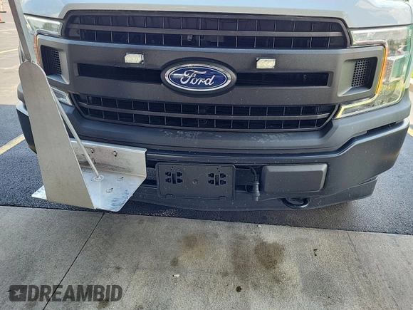 2018 Ford F-150 XL with VIN 1FTNF1E52JKE87531, listed as a IAAI auction lot 42740984 with 121,670 mi miles and . Bid and sale history available at DreamBid. Image 19.