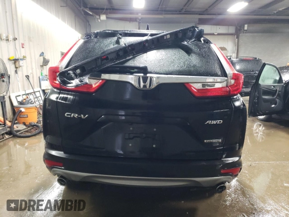 2017 Honda CR-V Touring with VIN 2HKRW2H91HH608340, listed as a Copart auction lot 43997625 with 58,446 mi miles and Salvage Title. Bid and sale history available at DreamBid. Image 6.