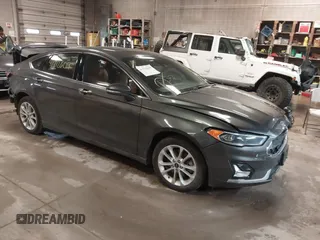 2019 Ford Fusion Energi Titanium with VIN 3FA6P0SUXKR143472, listed as a IAAI auction lot 41712609 with 65,450 mi miles. Bid and sale history available at carsss.com. Image 1.