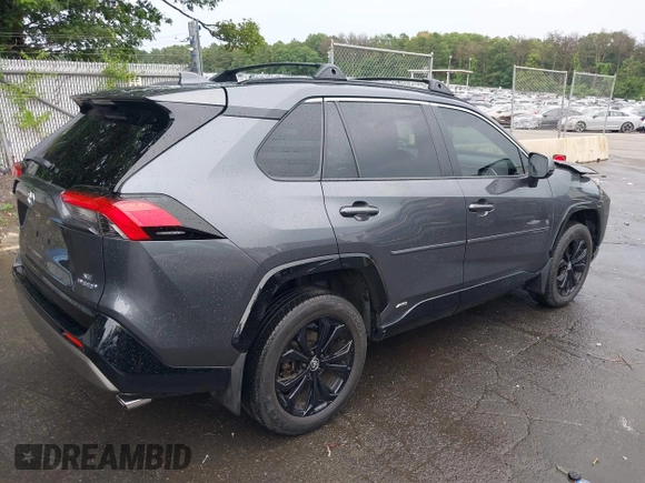 2022 Toyota RAV4 Hybrid SE with VIN JTM16RFV7ND067284, listed as a IAAI auction lot 42637821 with 20,512 mi miles and . Bid and sale history available at DreamBid. Image 4.