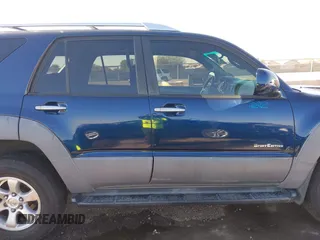 2003 Toyota 4Runner SR5 with VIN JTEZT14R238001097, listed as a IAAI auction lot 41266011 with 180,905 mi miles. Bid and sale history available at carsss.com. Image 13.