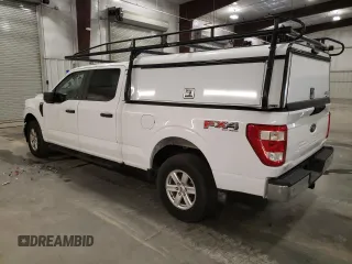 2021 Ford F-150 XL with VIN 1FTFW1E8XMKE65151, listed as a Copart auction lot 52579095 with 77,927 mi miles and Salvage Title. Bid and sale history available at carsss.com. Image 2.