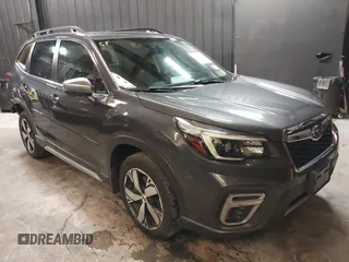2021 Subaru Forester Touring z VIN JF2SKAXCXMH450062, wystawiony jako IAAI lot #42441732 z przebiegiem 44 258 mil mil oraz . Historia ofert i sprzedaży dostępna na DreamBid. Obrazek 1.
