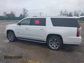 2016 GMC Yukon XL Denali with VIN 1GKS2HKJ9GR264481, listed as a IAAI auction lot 41764272 with 114,852 mi miles. Bid and sale history available at carsss.com. Image 14.