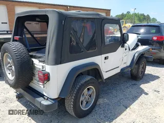 1998 Jeep Wrangler Sport с VIN 1J4FY19S2WP721248, выставлен на аукционе IAAI как лот 42553613 с пробегом 186 494 миль миль и . История ставок и продаж доступна на DreamBid. Изображение 4.