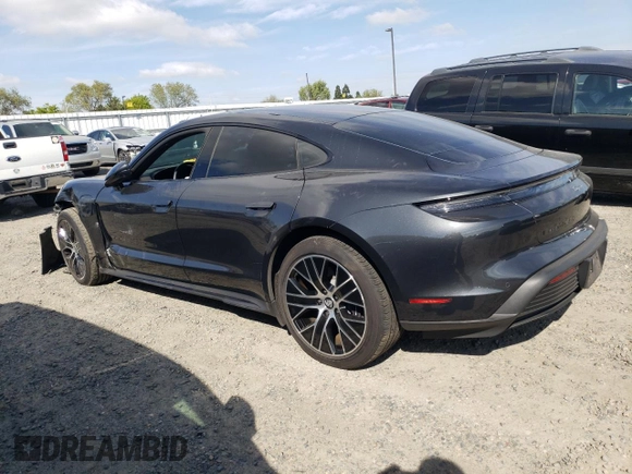 2023 Porsche Taycan with VIN WP0AA2Y18PSA16703, listed as a Copart auction lot 50559135 with 11,428 mi miles and Salvage Title. Bid and sale history available at DreamBid. Image 2.