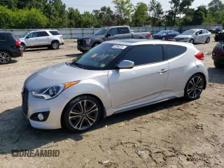 2016 Hyundai Veloster Turbo with VIN KMHTC6AEXGU254380, listed as a Copart auction lot 60766373 with 135,056 mi miles. Bid and sale history available at carsss.com. Image 1.