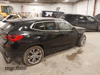 2020 BMW X2 xDrive28i z VIN WBXYJ1C00L5R79711, wystawiony jako IAAI lot #41051383 z przebiegiem Nie podano mil oraz . Historia ofert i sprzedaży dostępna na DreamBid. Obrazek 4.