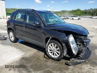 2017 Volkswagen Tiguan S with VIN WVGAV7AXXHK054783, listed as a Copart auction lot 52414725 with 156,671 mi miles and Salvage Title. Bid and sale history available at DreamBid. Image 4.