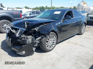 2012 Cadillac CTS Performance z VIN 1G6DJ5E30C0156576, wystawiony jako IAAI lot #42287858 z przebiegiem 106 497 mil mil oraz . Historia ofert i sprzedaży dostępna na DreamBid. Obrazek 18.