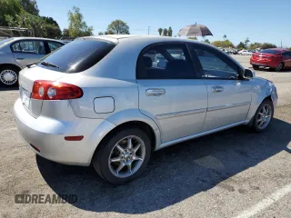 2006 Suzuki Reno z VIN KL5JD66Z36K455929, wystawiony jako Copart lot #49444974 z przebiegiem Nie podano mil oraz Szkody całkowita. Historia ofert i sprzedaży dostępna na DreamBid. Obrazek 3.
