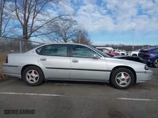 2003 Chevrolet Impala with VIN 2G1WF52E639136361, listed as a IAAI auction lot 41216021 with 135,055 mi miles. Bid and sale history available at carsss.com. Image 13.