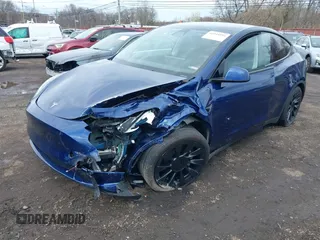 2023 Tesla Model Y Long Range with VIN 7SAYGDEE4PF891709, listed as a IAAI auction lot 41944893 with 15,864 mi miles. Bid and sale history available at carsss.com. Image 2.