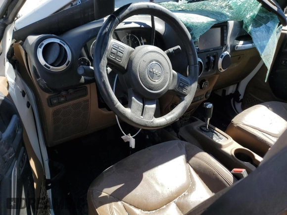 2013 Jeep Wrangler Unlimited Rubicon with VIN 1C4HJWFG4DL549356, listed as a Copart auction lot 46799055 with 172,327 mi miles and Salvage Title. Bid and sale history available at carsss.com. Image 8.