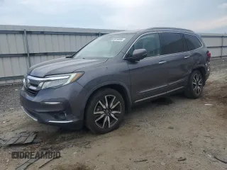 2019 Honda Pilot Elite with VIN 5FNYF6H07KB014765, listed as a Copart auction lot 59199385 with 117,441 mi miles and Salvage title. Bid and sale history available at DreamBid. Image 1.