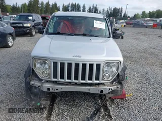 2011 Jeep Liberty Sport z VIN 1J4PN2GK9BW503376, wystawiony jako IAAI lot #42143053 z przebiegiem 168 841 mil mil oraz . Historia ofert i sprzedaży dostępna na DreamBid. Obrazek 13.