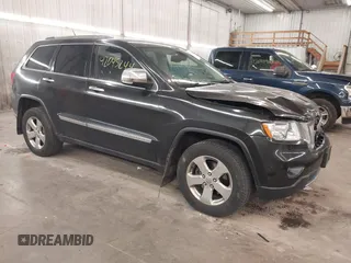 2012 Jeep Grand Cherokee Limited z VIN 1C4RJFBG3CC123800, wystawiony jako IAAI lot #42045244 z przebiegiem 186 500 mil mil oraz . Historia ofert i sprzedaży dostępna na DreamBid. Obrazek 1.