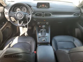 2018 Mazda CX-5 Grand Touring с VIN JM3KFADM3J1351532, выставлен на аукционе Copart как лот 55567405 с пробегом 99 134 миль миль и Списание • Salvage title. История ставок и продаж доступна на DreamBid. Изображение 8.