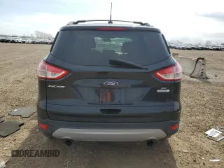 2013 Ford Escape SE z VIN 1FMCU0GX1DUA20580, wystawiony jako Copart lot #52644595 z przebiegiem 151 143 mil mil oraz Szkoda całkowita • Salvage title. Historia ofert i sprzedaży dostępna na DreamBid. Obrazek 6.