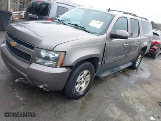 2013 Chevrolet Suburban LT with VIN 1GNSCJE03DR160204, listed as a IAAI auction lot 41370448 with 246,952 mi miles. Bid and sale history available at carsss.com. Image 22.