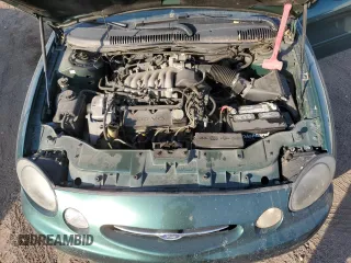 1999 Ford Taurus SE z VIN 1FAFP53U4XA114160, wystawiony jako Copart lot #74946714 z przebiegiem 106 708 mil mil oraz Szkody całkowita. Historia ofert i sprzedaży dostępna na DreamBid. Obrazek 12.