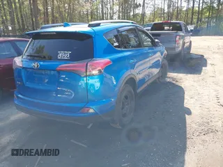 2018 Toyota RAV4 LE with VIN JTMBFREV3JJ253566, listed as a IAAI auction lot 41978107 with 49,729 mi miles. Bid and sale history available at carsss.com. Image 4.