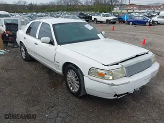 2009 Mercury Grand Marquis LS with VIN 2MEHM75V19X608157, listed as a IAAI auction lot 41839999 with 171,739 mi miles. Bid and sale history available at carsss.com. Image 1.