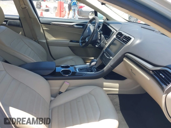 2013 Ford Fusion SE Hybrid z VIN 3FA6P0LU4DR259073, wystawiony jako IAAI lot #42197143 z przebiegiem 87 337 mil mil oraz . Historia ofert i sprzedaży dostępna na DreamBid. Obrazek 5.