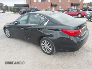 2015 Infiniti Q50 Premium z VIN JN1BV7ARXFM410177, wystawiony jako IAAI lot #41936999 z przebiegiem 129 123 mil mil oraz . Historia ofert i sprzedaży dostępna na DreamBid. Obrazek 3.