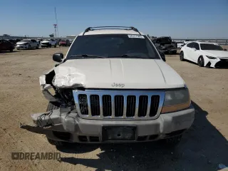 1999 Jeep Grand Cherokee Laredo с VIN 1J4G258S8XC735159, выставлен на аукционе Copart как лот 56247505 с пробегом 241 636 миль миль и Списание • Salvage title. История ставок и продаж доступна на DreamBid. Изображение 5.