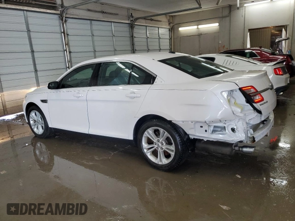 2016 Ford Taurus SEL with VIN 1FAHP2E84GG112803, listed as a Copart auction lot 54372645 with 79,999 mi miles and Salvage Title. Bid and sale history available at DreamBid. Image 2.