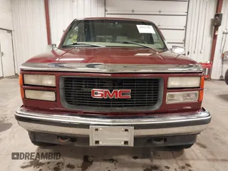 1999 GMC Yukon with VIN 1GKEK13R3XJ700930, listed as a IAAI auction lot 40915481 with 249,773 mi miles. Bid and sale history available at carsss.com. Image 12.