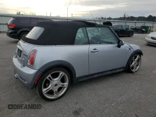 2005 MINI Convertible S with VIN WMWRH33575TK56034, listed as a Copart auction lot 88043565 with 33,410 mi miles and Salvage title. Bid and sale history available at DreamBid. Image 3.