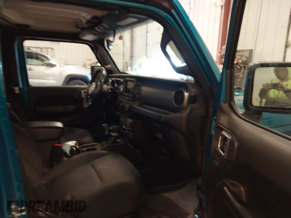 2019 Jeep Wrangler Unlimited Sport Altitude with VIN 1C4HJXDG0KW617379, listed as a IAAI auction lot 42005517 with 91,296 mi miles and . Bid and sale history available at DreamBid. Image 5.