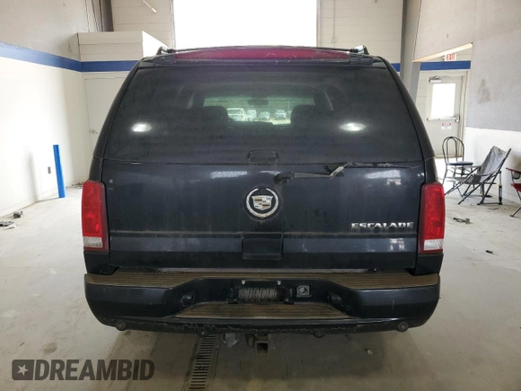 2006 Cadillac Escalade z VIN 1GYEK63N56R139033, wystawiony jako Copart lot #59661465 z przebiegiem Nie podano mil oraz Czysty tytuł • Clean title. Historia ofert i sprzedaży dostępna na DreamBid. Obrazek 6.