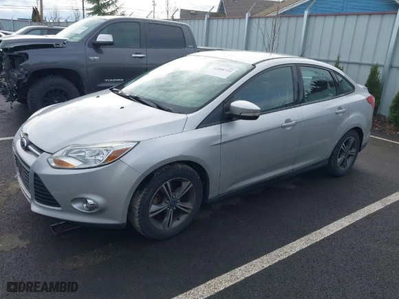 2014 Ford Focus SE with VIN 1FADP3F23EL454603, listed as a IAAI auction lot 41896721 with 210,548 mi miles. Bid and sale history available at carsss.com. Image 2.