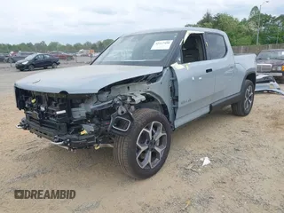 2023 Rivian R1T Adventure z VIN 7FCTGBAA6PN028520, wystawiony jako IAAI lot #42117498 z przebiegiem 24 583 mil mil oraz . Historia ofert i sprzedaży dostępna na DreamBid. Obrazek 20.