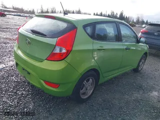 2012 Hyundai Accent GS with VIN KMHCT5AE9CU021238, listed as a IAAI auction lot 41762650 with 166,287 mi miles. Bid and sale history available at carsss.com. Image 4.
