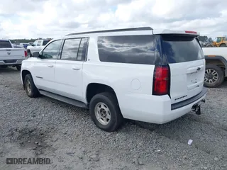 2019 Chevrolet Suburban LT with VIN 1GNSCHKC8KR405969, listed as a IAAI auction lot 41532271 with 107,003 mi miles. Bid and sale history available at carsss.com. Image 3.