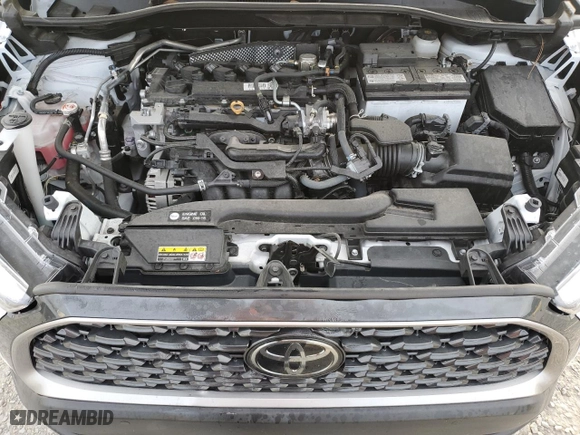 2022 Toyota Corolla Cross XLE with VIN 7MUEAAAG8NV029308, listed as a Copart auction lot 87407224 with 21,590 mi miles and Salvage Title. Bid and sale history available at carsss.com. Image 11.
