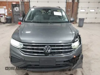 2022 Volkswagen Tiguan S z VIN 3VV0B7AX2NM042934, wystawiony jako IAAI lot #42172199 z przebiegiem 71 367 mil mil oraz . Historia ofert i sprzedaży dostępna na DreamBid. Obrazek 12.