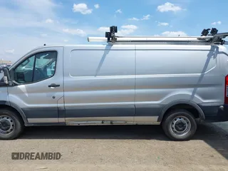 2020 Ford Transit Cargo z VIN 1FTYE1Y80LKB53684, wystawiony jako IAAI lot #42556377 z przebiegiem 102 801 mil mil oraz . Historia ofert i sprzedaży dostępna na DreamBid. Obrazek 15.