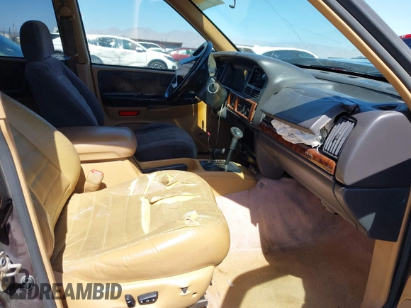 1996 Jeep Grand Cherokee Laredo with VIN 1J4GZ58S3TC391942, listed as a IAAI auction lot 41711778 with 202,765 mi miles. Bid and sale history available at carsss.com. Image 5.