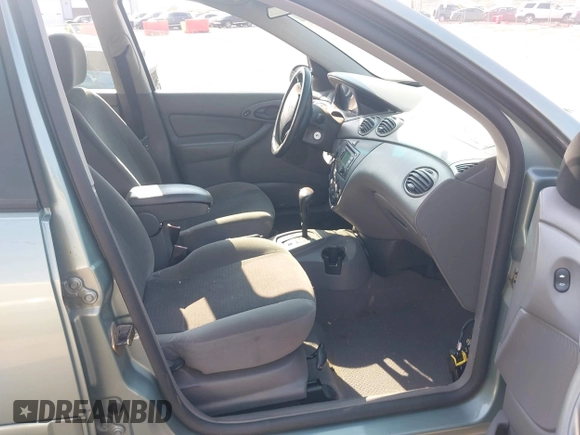 2003 Ford Focus SE with VIN 1FAFP34P33W252024, listed as a IAAI auction lot 42484082 with 125,777 mi miles and . Bid and sale history available at DreamBid. Image 5.
