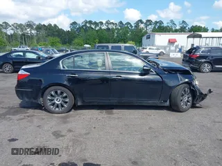 2010 Hyundai Genesis with VIN KMHGC4DE8AU076185, listed as a IAAI auction lot 41996812 with 147,645 mi miles. Bid and sale history available at carsss.com. Image 13.