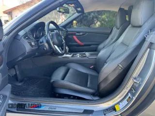 2011 BMW Z4 sDrive35i with VIN WBALM7C57BE383536, listed as a Copart auction lot 49841415 with 107,044 mi miles and Clean Title. Bid and sale history available at carsss.com. Image 5.