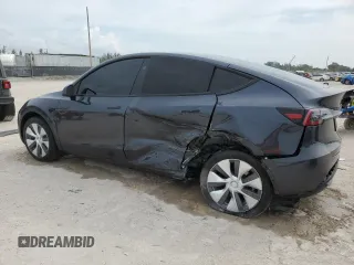 2024 Tesla Model Y Long Range with VIN 7SAYGDEE3RA253354, listed as a Copart auction lot 50524105 with 10,353 mi miles and Salvage Title. Bid and sale history available at DreamBid. Image 2.