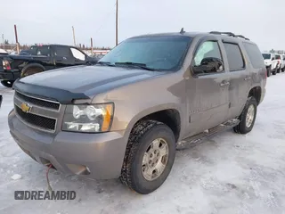2013 Chevrolet Tahoe LT with VIN 1GNSKBE0XDR296094, listed as a IAAI auction lot 41448160 with 167,165 mi miles and . Bid and sale history available at DreamBid. Image 17.