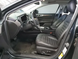 2015 Ford Fusion SE z VIN 3FA6P0H98FR295646, wystawiony jako Copart lot #57055105 z przebiegiem 121 515 mil mil oraz Szkoda całkowita • Salvage title. Historia ofert i sprzedaży dostępna na DreamBid. Obrazek 7.
