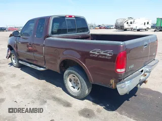 2000 Ford F-150 XL with VIN 1FTRX18L5YNA99713, listed as a IAAI auction lot 42194838 with Not provided miles and . Bid and sale history available at DreamBid. Image 3.